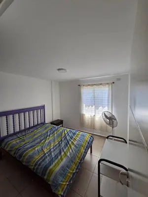 a bedroom with a bed and a window at Depto Completo 1 Hab Gral Paz in Cordoba