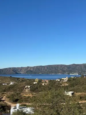 a view of a lake from a hill at Bella Vista in Villa Carlos Paz