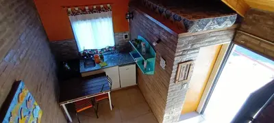 an overhead view of a kitchen in a tiny house at Xaraba in Villa Parque Siquiman