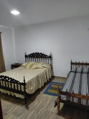 a bedroom with two beds in a room at Mi Destino in Tanti