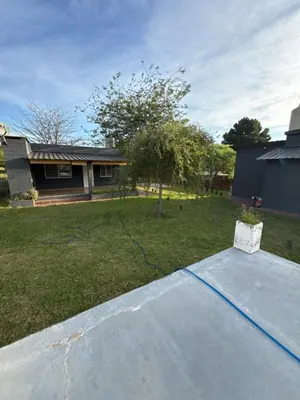 a yard with a house and a house with a roof at Cabañas Marquetti 2 in Potrero de Garay