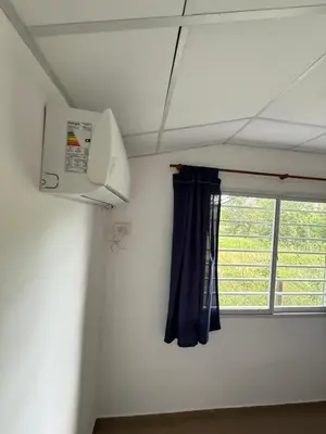 a room with a window and a fan at Cabañas Marquetti 2 in Potrero de Garay