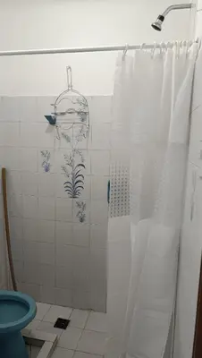 a bathroom with a shower with a shower curtain at La Casita de Daniel in San Antonio de Arredondo