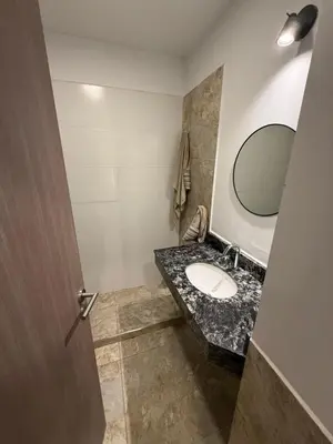 a bathroom with a sink and a mirror at Estilo y Relax en Manantiales ll in Cordoba