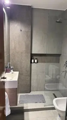 a bathroom with a shower and a sink at Departamento Nueva Córdoba in Cordoba
