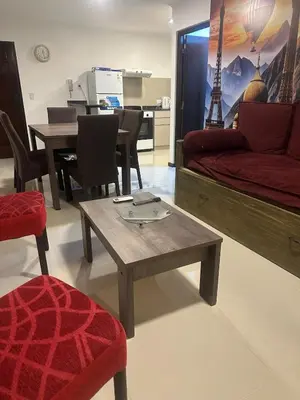 a living room with a couch and a coffee table at Veneto Village Dpto T3 1 K in Villa Parque Siquiman