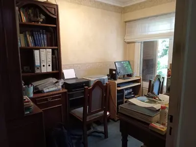 an office with a desk with a computer and a chair at Bienvenidos a casa in Cordoba