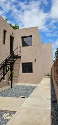 a building with a staircase on the side of it at LitStay - San Martin in Cordoba