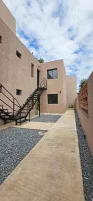 a building with a staircase on the side of it at LitStay - San Martin in Cordoba