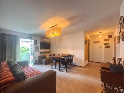 a living room with a couch and a table at Depto Victoria in Cordoba