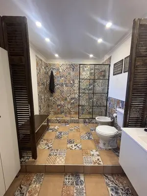 a bathroom with a toilet and a sink at Apartment in the historic center in Cordoba