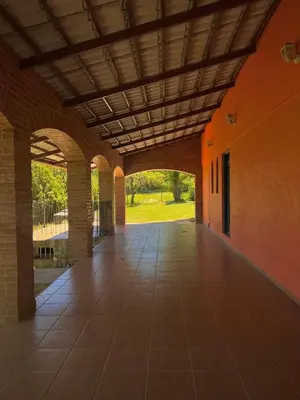 an empty hallway of a building with an arcade at Mar y Mar Naturaleza y comodidad in La Estancia