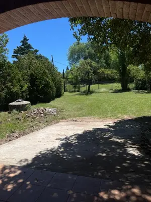 a park with trees and a dirt road at Mar y Mar Naturaleza y comodidad in La Estancia