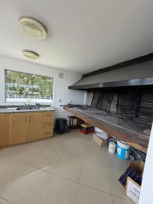 a kitchen with a large counter and a sink at Depto Carillo 4p in Villa Carlos Paz