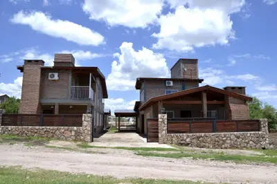 an image of a house with two towers at Rio De Arena in Nono