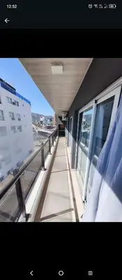 a view of a balcony of a building with windows at Departamento en Veneto 4 u 8 in Villa Carlos Paz