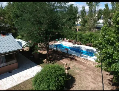 an overhead view of a swimming pool in a yard at Colores de Traslasierra in Mina Clavero