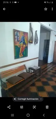 a picture of a room with a painting on the wall at Estancia San Carlos in Villa del Dique
