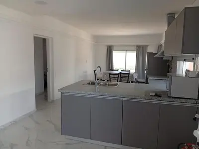 a kitchen with a sink and a counter top at Ein gutes Haus in Mina Clavero