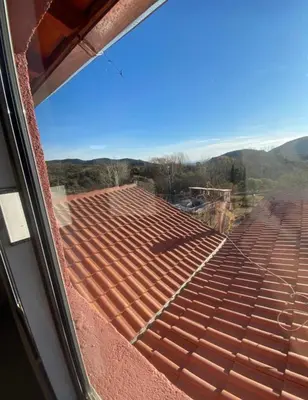 a view from a window of a roof at Casona de Montaña in Los Hornillos