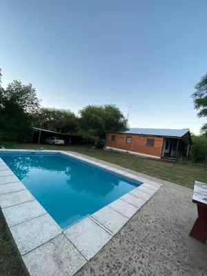 a swimming pool in the yard of a house at Green mile in San Roque