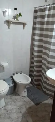 a bathroom with a sink and a toilet and a shower at Cabañas de Ensueño in Cuesta Blanca