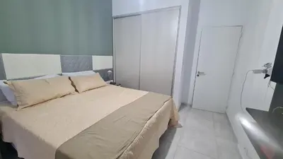 a bedroom with a large bed in a room at Romina Cañada in Cordoba