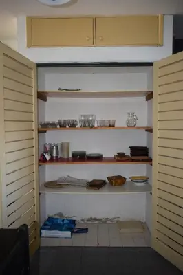 a kitchen with shelves with food on them at Casa Santa Lucía in Bialet Massé