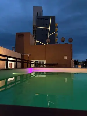 a swimming pool on top of a building at Amelia 2-1 in Villa Carlos Paz