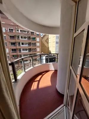 a balcony of a building with a walkway at Apartment in Nueva Córdoba for you! in Cordoba