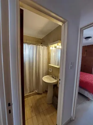 a bathroom with a sink and a toilet and a shower at Apartment in Nueva Córdoba for you! in Cordoba