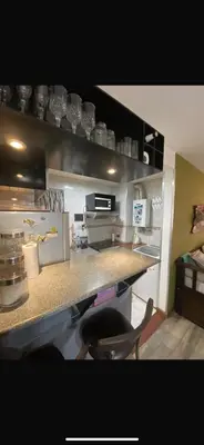 a kitchen with a counter and a counter top at Vanrod in Cordoba