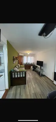 a large living room with a couch and a television at Vanrod in Cordoba
