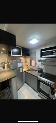 a kitchen with a stove top oven in a kitchen at Vanrod in Cordoba