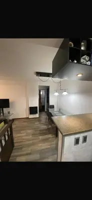 an empty room with a kitchen and a counter top at Vanrod in Cordoba