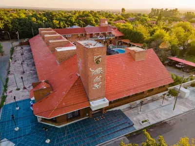 an overhead view of a house with a red roof at Hotel Valle Del Sol in Merlo