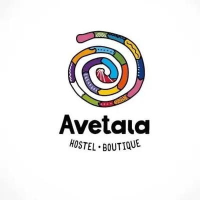 a logo for anza medical butte with a colorful spiral at Hostel Avetaia in Santa Rosa de Calamuchita