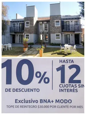 a house for sale with a sign in front of it at Complejo Entre Marte y La Luna in Merlo