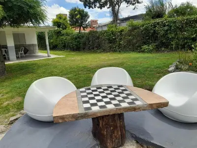 a table with a checkered chessboard on top of it at Sierras Del Sol in Villa Carlos Paz