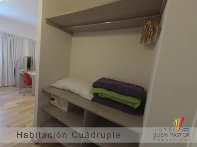 a room with a shelf with a bed in it at Buen Pastor Capuchinos in Cordoba