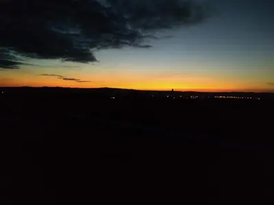a sunset with the sky in the background at Campo de los Zorros in Nono