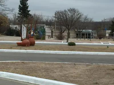 two orange vases sitting on the side of a road at Hosteria Renca in Renca
