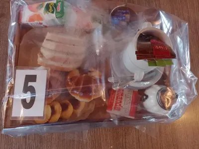 a package of food that is on a table at Complejo Los Gringos in Villa Ciudad de America