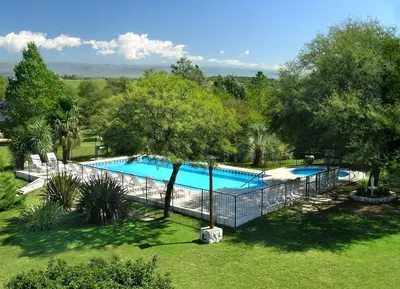 an overhead view of a swimming pool in a park at Solar Encantado Cabañas & Chalet in Villa General Belgrano