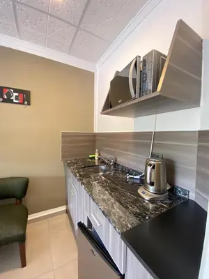 a kitchen with a sink and a counter top at Alto Valle in Nono