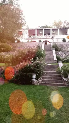 a group of stairs leading to a building at El Cortijo de la villa in Villa Independencia
