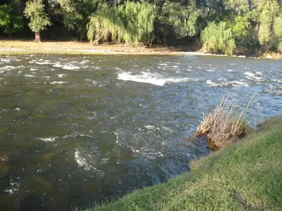 a river with some waves in the water at La casa de Almirall in Santa Rosa de Calamuchita