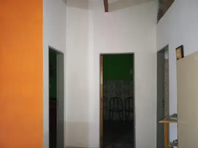 a room with white walls and two doors at Casa Reinamora in Villa Parque Siquiman