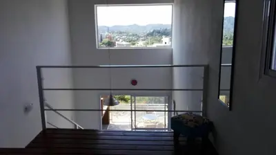 a view of a staircase with a large window at Duplex la Delfina 1 in Villa Carlos Paz
