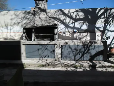 a shadow of a building with a window at Departamento El Nogal in Alta Gracia